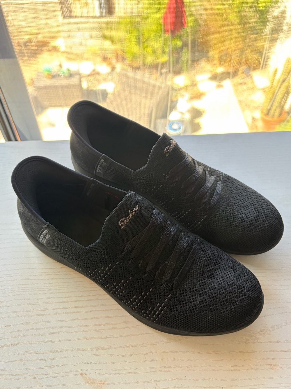 Skechers Women’s Black Knit Slip-On Sneakers